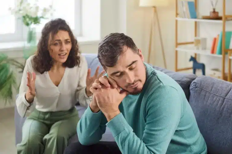 Weary couple finding relief through a family recovery program that replaces policing with structure and accountability